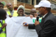 DCC signs peace banner and flags peace walk