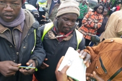 residents signing peace pledges in eldoret